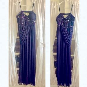 Strapless dark purple gown with cutouts